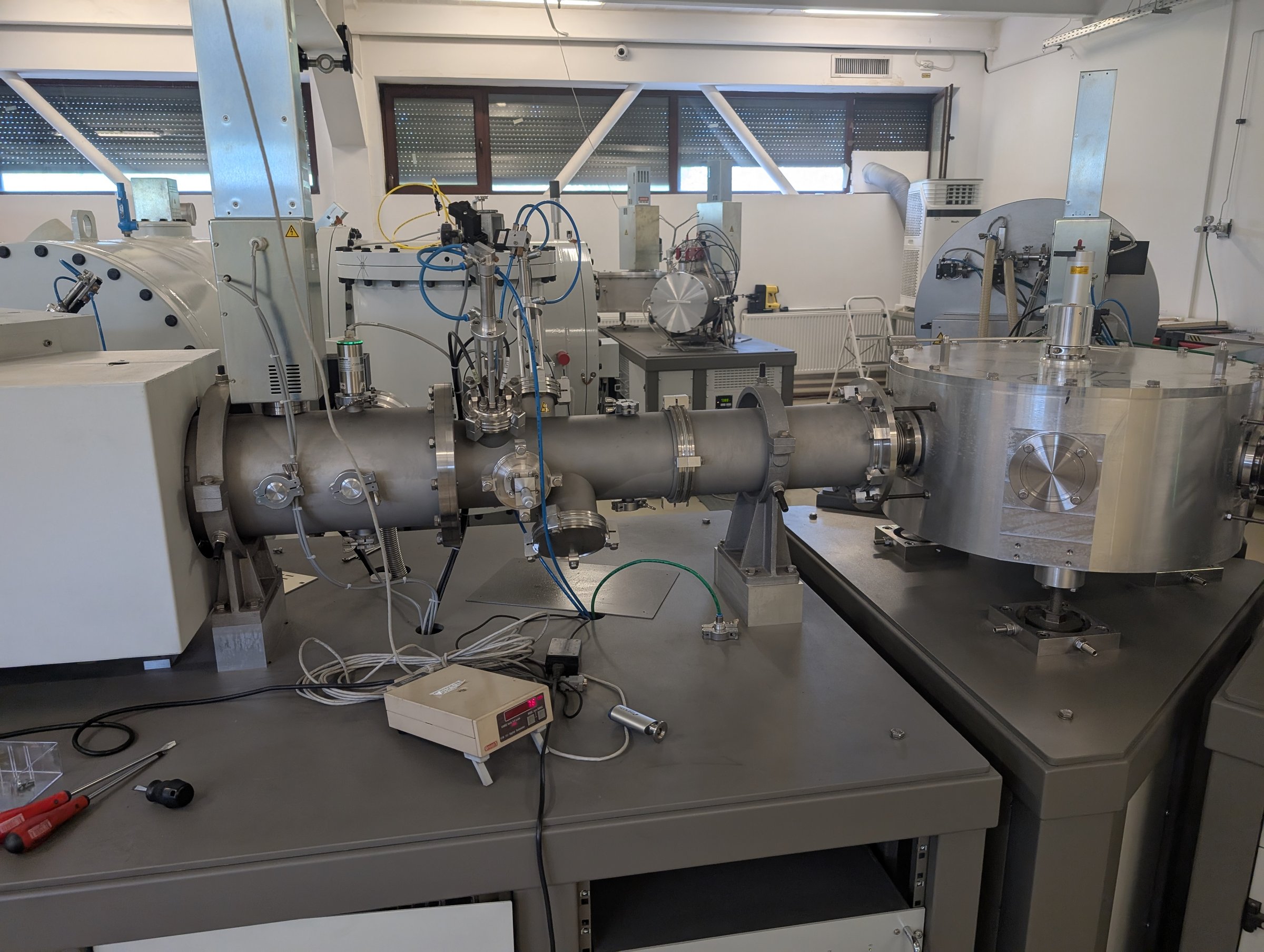 Electrostatic analyser of the 1 MV AMS — flat cylindrical vacuum chamber with high-voltage feedthrough, next to the beam line