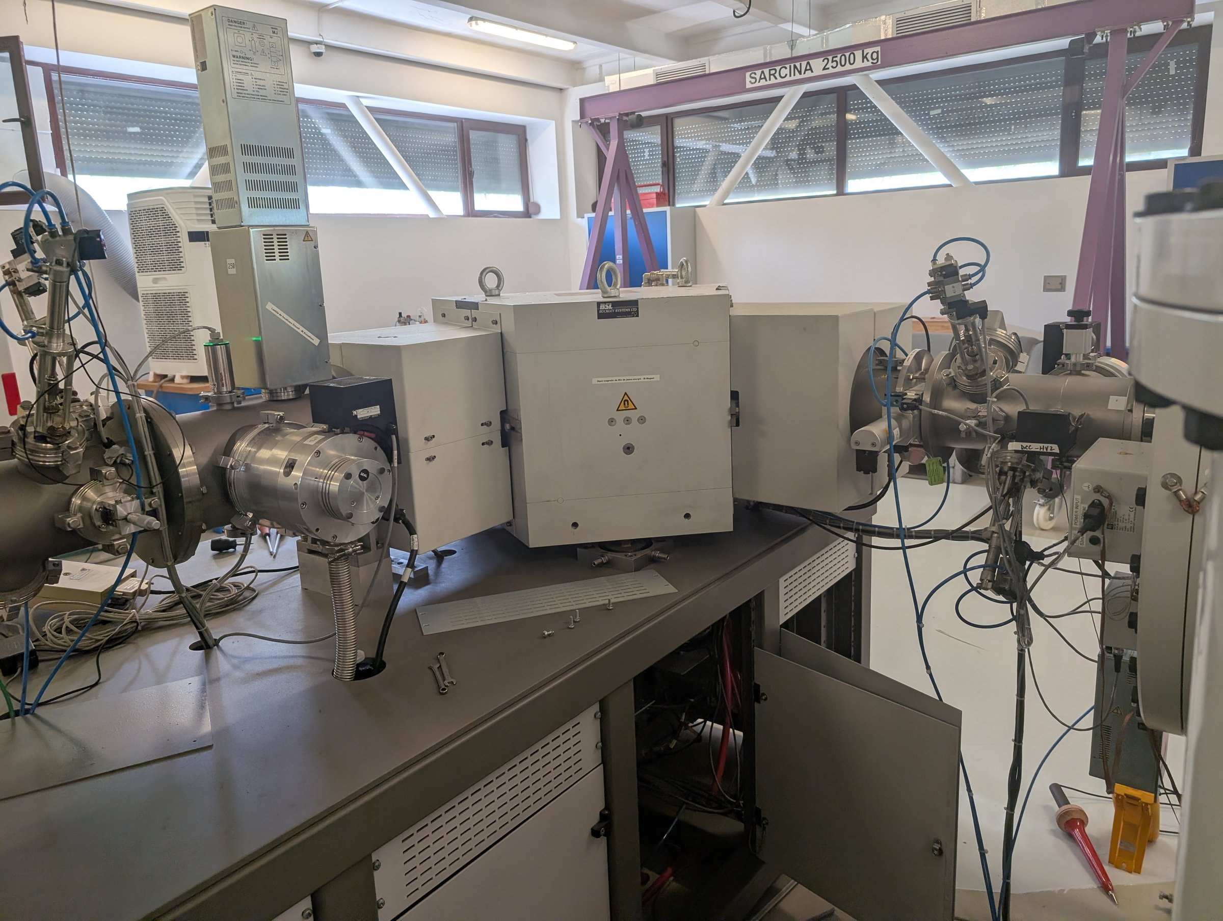The 90-degree injection dipole magnet of the 1 MV AMS — large white disc-shaped magnet standing on edge over the injection beam line