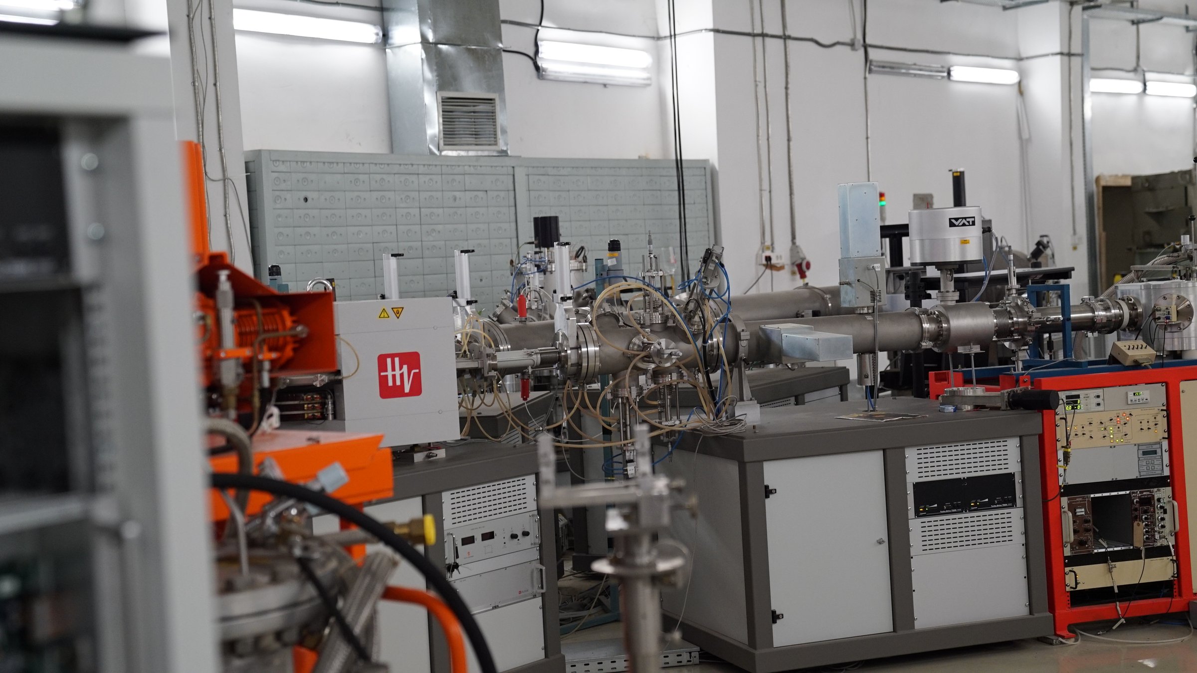 Beam lines of the 3 MV Tandetron, with the HVEE high-voltage unit and a VAT vacuum valve