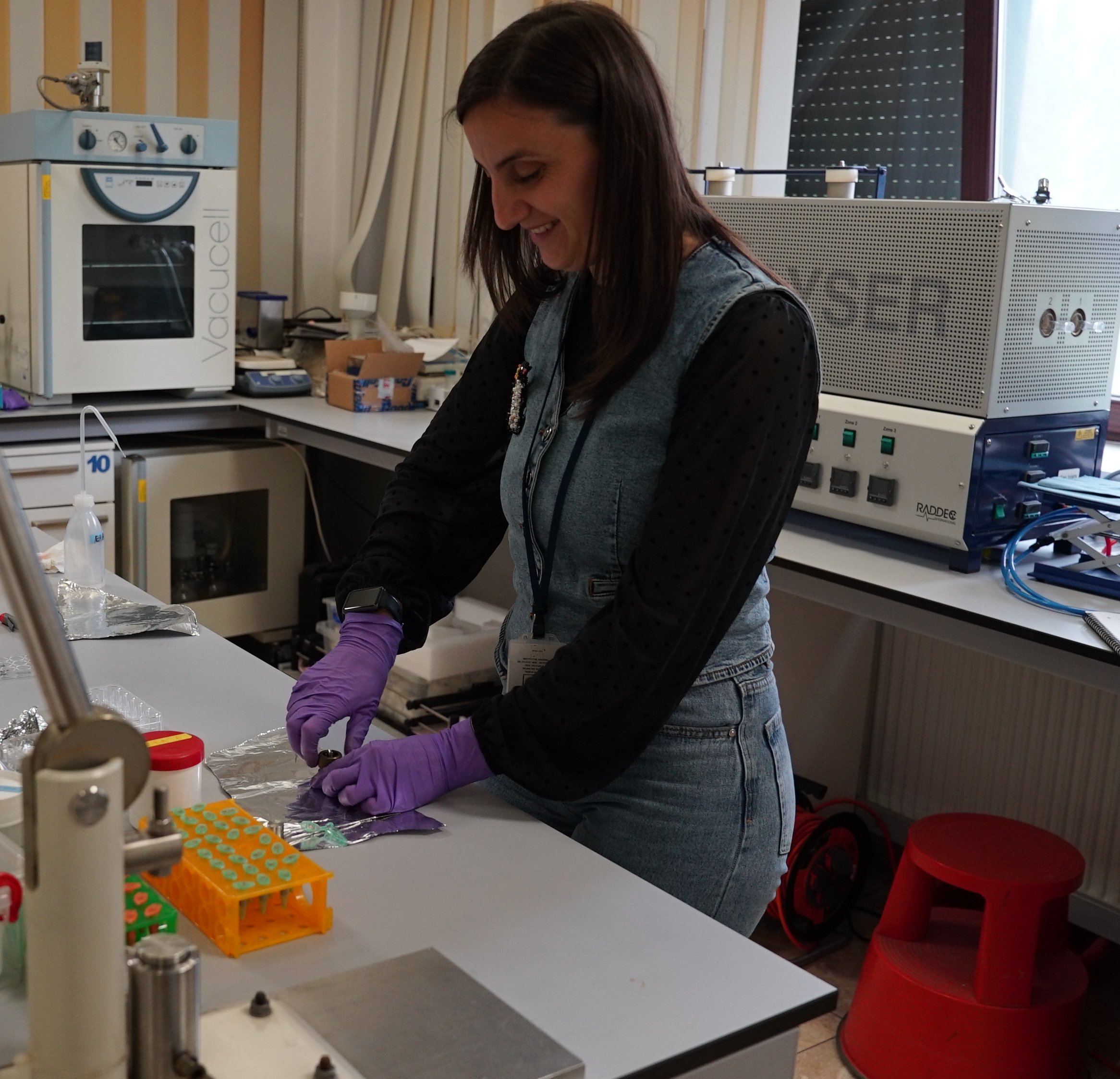 Researcher preparing radiocarbon samples at the bench in the DFNA chemistry laboratory