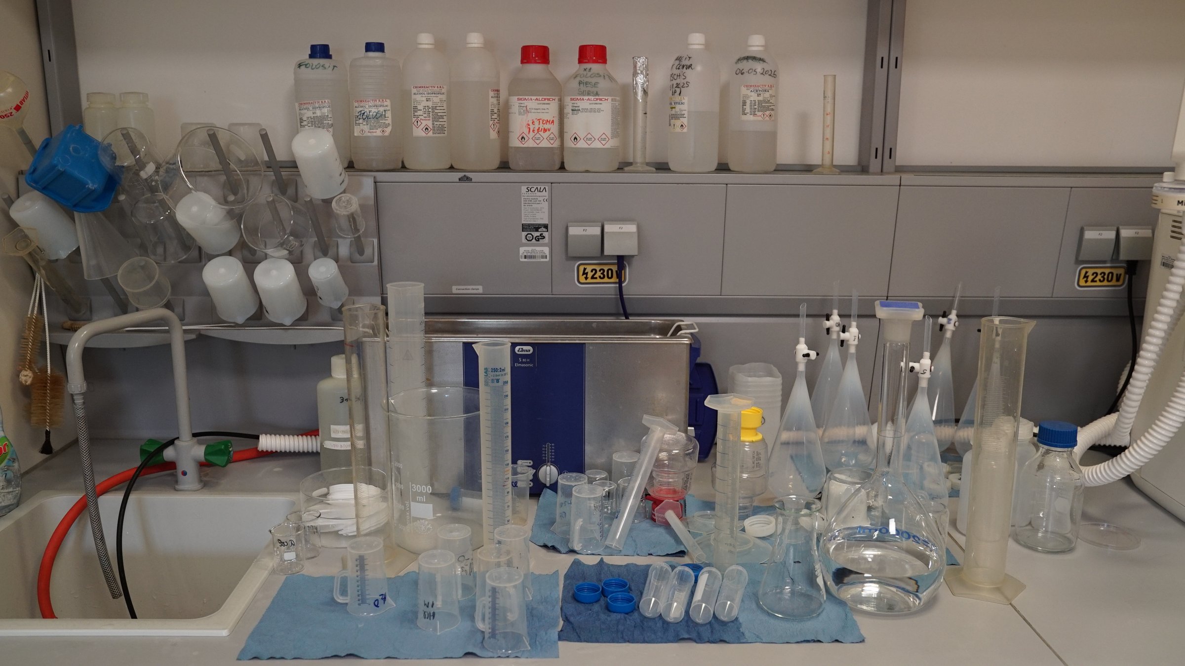 DFNA Chemistry Laboratory — wet-chemistry bench with glassware and reagents