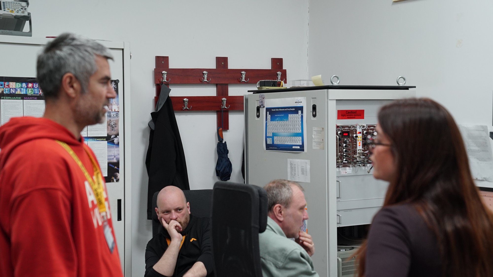 Trainees at the electronics racks along a beamline