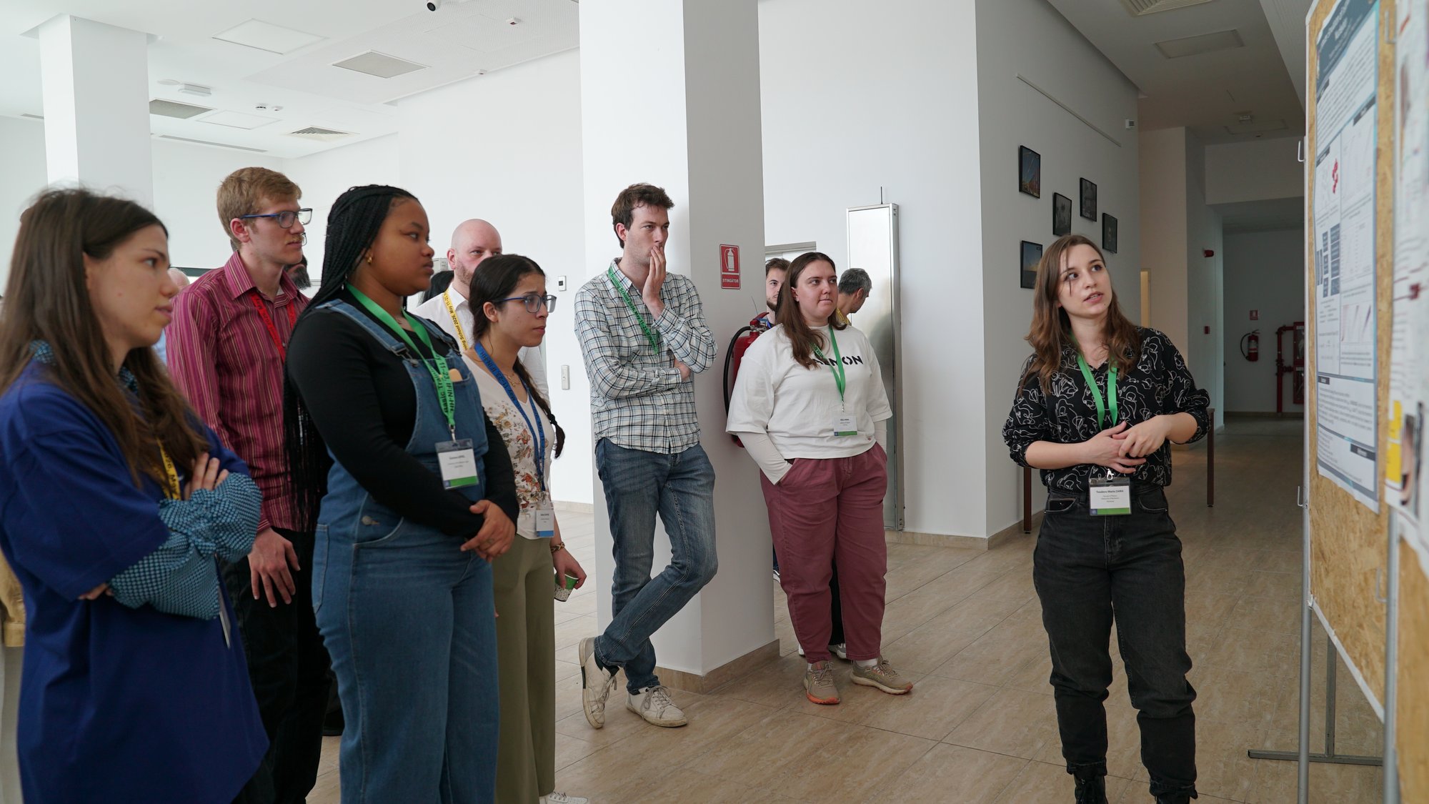 An international group of trainees in animated discussion