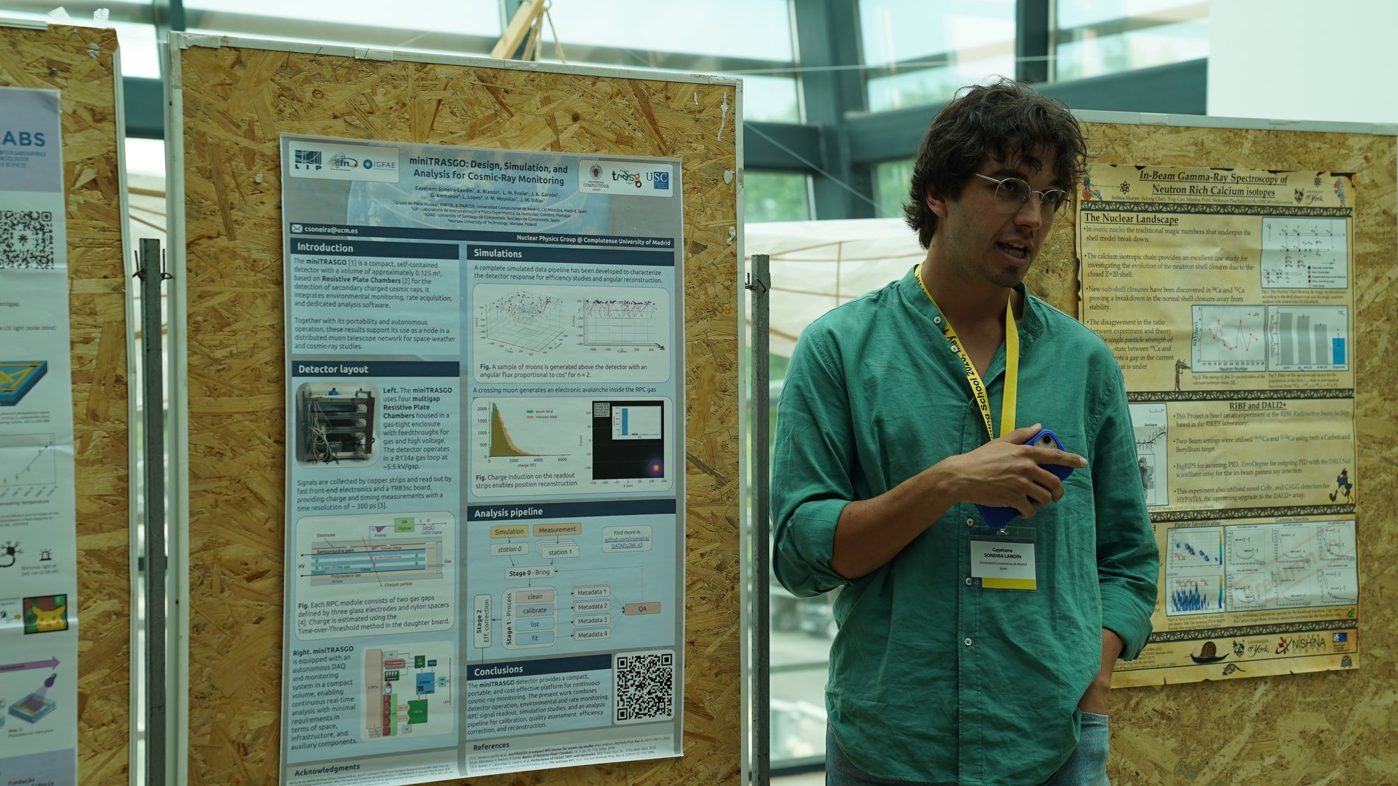 A trainee presenting her own poster to the group