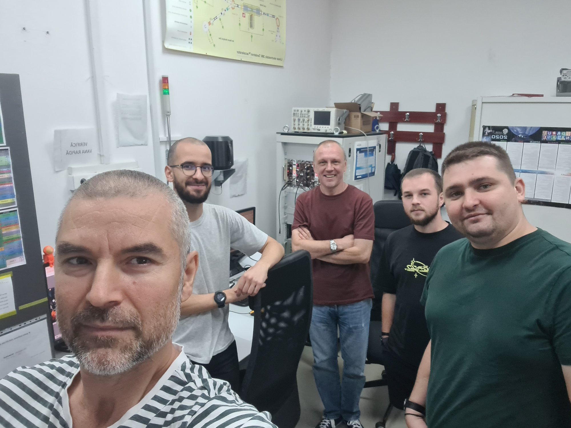 Team members celebrating a successful ATmega328P irradiation run